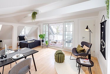 Alt-Sendling: Roof terrace apartment in historic old building