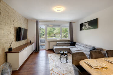 Apartment with balcony and view of the shared garden