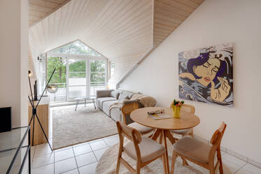 Top-Floor Apartment: Bright, Quiet, with Green Views