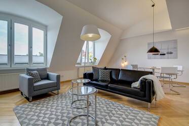 Luxurious attic apartment with roof-deck near Münchner Freiheit